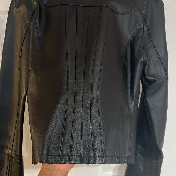 Gently used Guess black leather jacket. Size M zippered sleeves - Picture 7 of 9